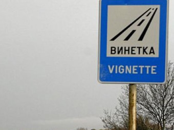 a blue and white sign with black text