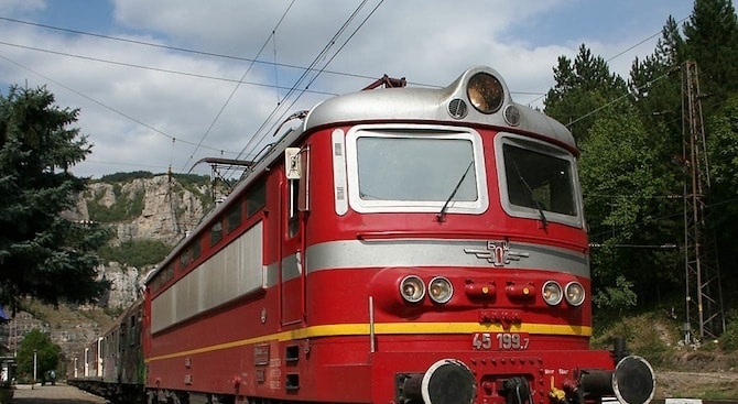 a red train on tracks