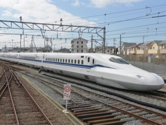 a white train on the tracks