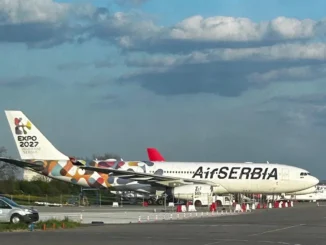 two airplanes on a runway