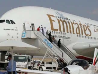 people boarding an airplane
